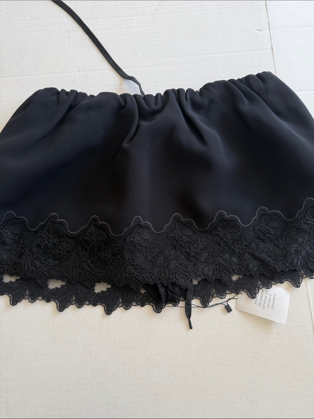 Held a women’s the scrunchie skort in very heavy crepe new